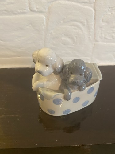 Nao lladro porcelain two - by,