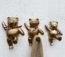 A Set Of Three Vintage Brass