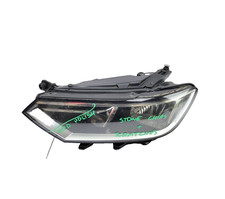 HEADLIGHT FRONT LEFT PASSENGER