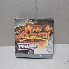 Insanity: Ultimate 60-day Cardio Workout 10 DVD fitness set featuring Shaun T