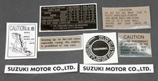 SUZUKI GS750 SET OF 8  DECALS, WARNING AND SIDE PANEL.