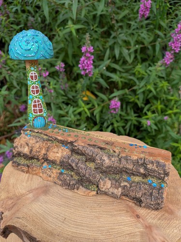 Mushroom fairy house with - fairy,