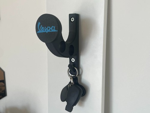 Motorcycle helmet holder - motorcycle, with