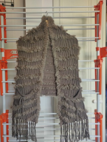 And rabbit fur gilet - me,
