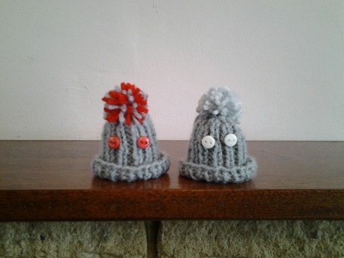 Rib design hand knitted egg - hand,