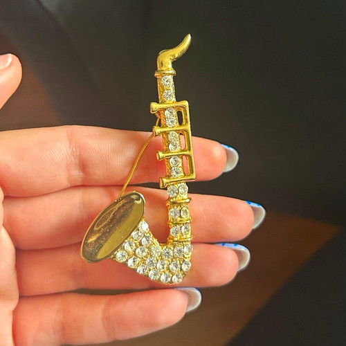 Gold tone metal saxophone - tone,