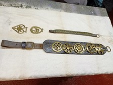 horse brasses on leather strap