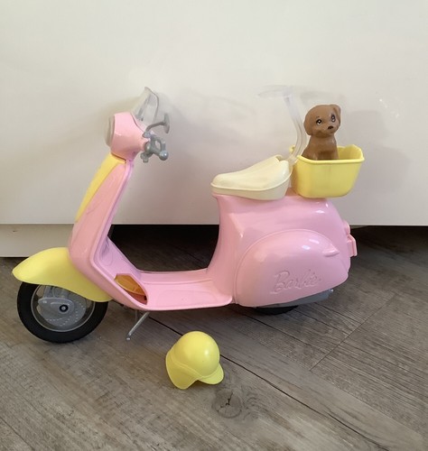 Barbie scooter with - with, dog