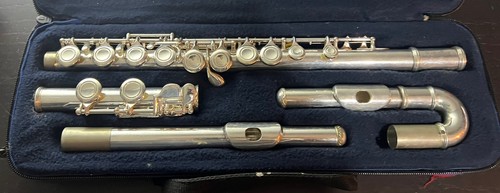 Used john packer - flute, and