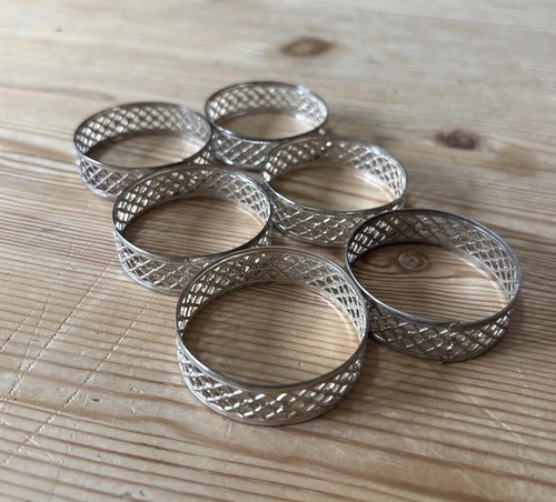 Silver napkin rings - x,
