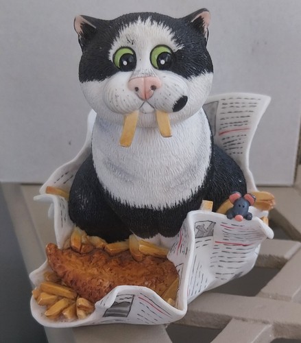 Comic and curious cats - and,
