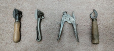 4 antique tin can openers