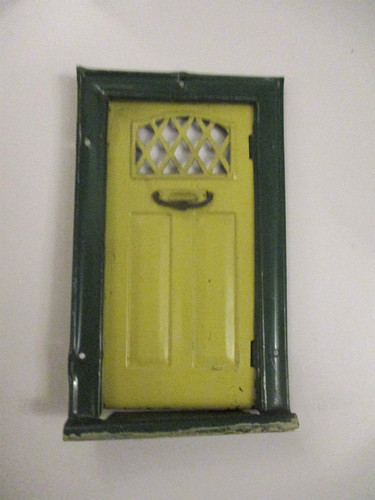 Old tin dolls - house, front
