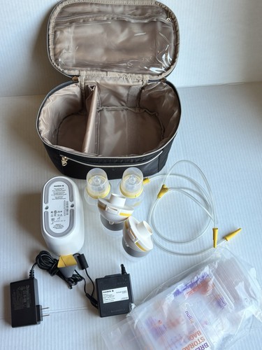 Medela breast pump - breast, in