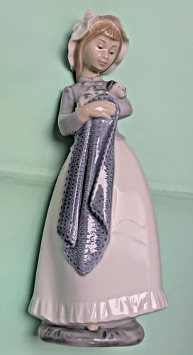 Nao lladro girl - by, holding