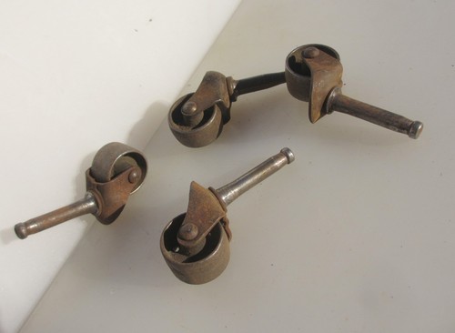 Antique iron furniture castors - antique,
