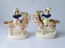 Pair Of Antique Staffordshire Flat Back Figurines Of Children Riding Goats 19thC