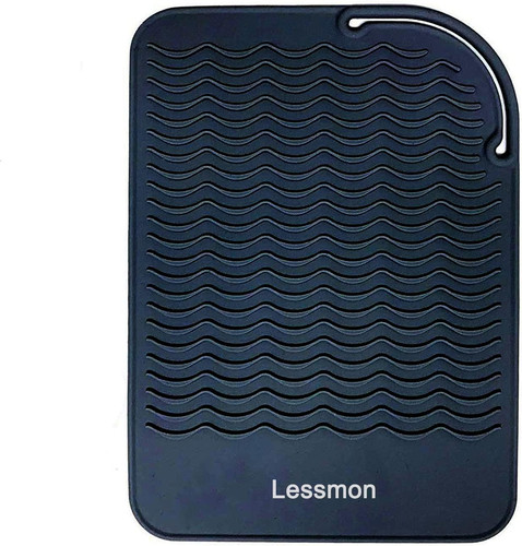 Heat resistant mat for curling - for,