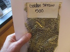 grizzle golden straw bag of