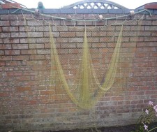 Piece of Old Vintage Nylon Herring Fishing Net with 4 cork floats