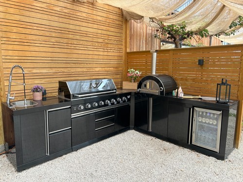 Shaped outdoor kitchen with - shaped,