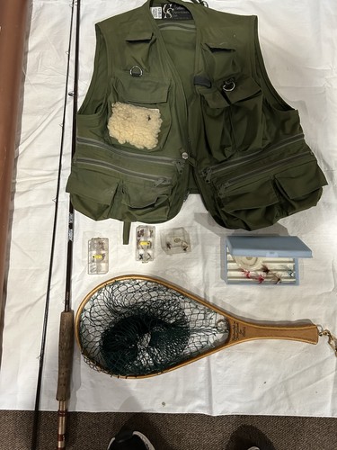 Fly fishing rod with vest - fly,