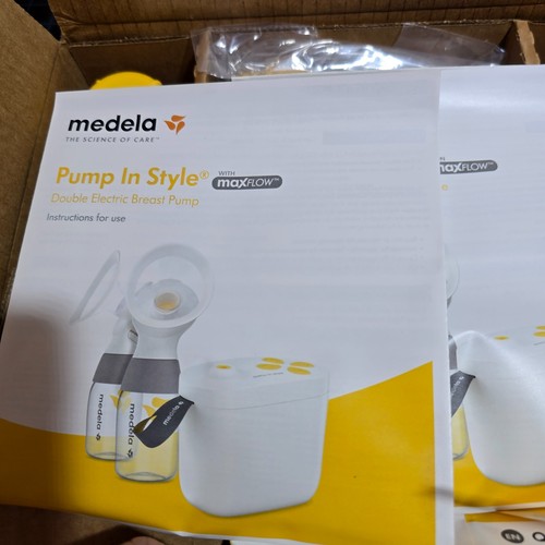 New medela pump - new, in