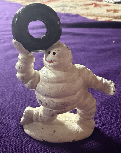 Vintage michelin man cast iron - michelin,