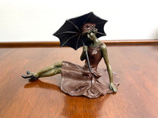 Bronze sculpture reclining