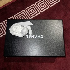 Empty Chanel box with ribbon