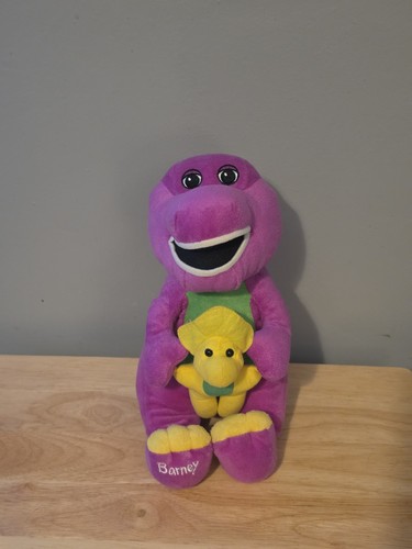 2013 barney dinosaur holding - 2013,