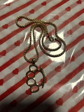 knuckle duster necklace in