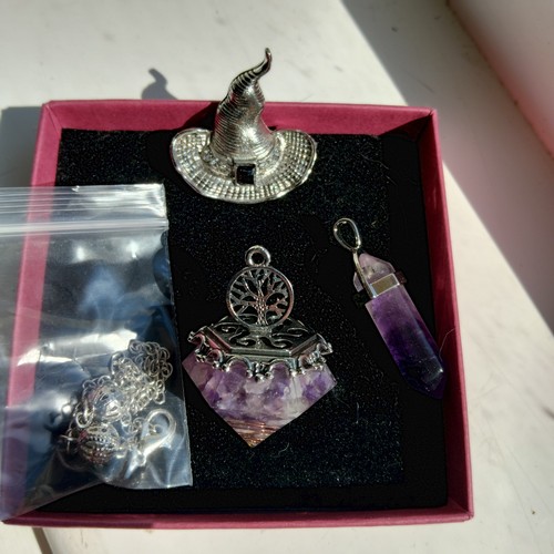 Amethyst pendulums and - , one
