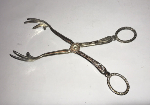 Sugar tongs ice - sugar,