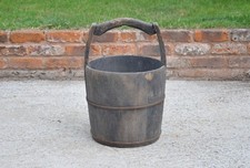 old vintage wooden rice bucket