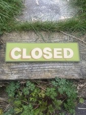 Hand painted  “Closed sign” sign writing sign in green 