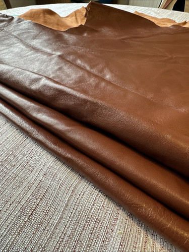 Brown upholstery - x,