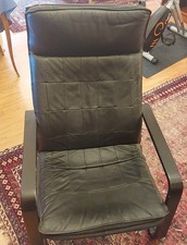 IKEA Poang Chair: Black frame with Black Leather upholster , decent condition.