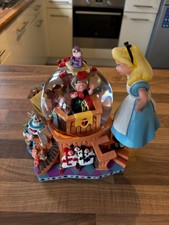 Disney snow globe Alice in