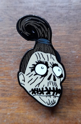 Shrunken head metal - shrunken,
