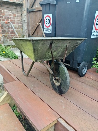 Vintage wheelbarrow ironcrete - vintage,