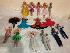 LOT OF 12 BARBIE DOLLS AND 3 KEN