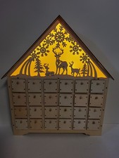 Christmas Countdown Wooden Advent Calendar Drawers Reindeer Lighted Background 