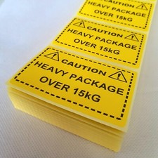 CAUTION HEAVY PACKAGE OVER