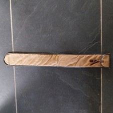 brown canvas bow case for