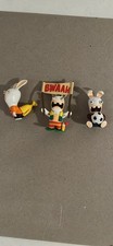 Three Raving Rabbids figures
