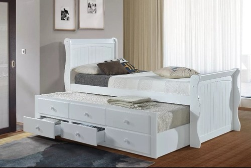Captain bed featuring trundle - bed,