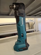 Makita DTM51 18V. 6000 - 20000min . For Parts only. See Description 