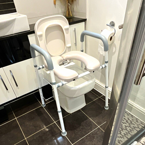 Adjustable elevated toilet - elevated,