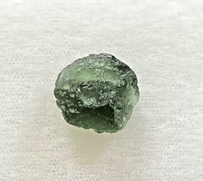 Deep green natural Moldavite (Vltavin) from the Czech Republic, 1.53 grams